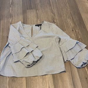 Black and white checkered top with bell sleeves